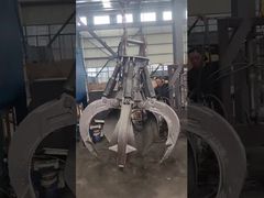 A casca alaranjada hidráulica de gerencio de 360 ​​graus luta hidráulica luta a construção